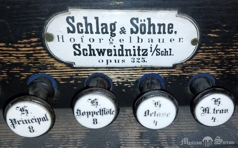 Manubria i tabliczka firmowa